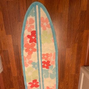 Surf board shaped rug